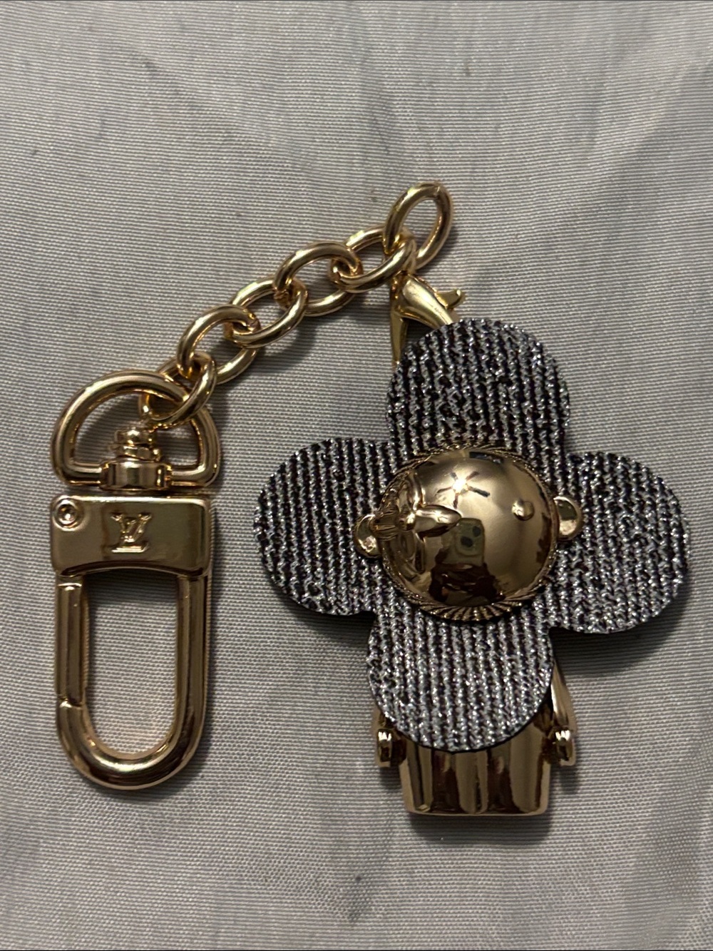 Louis Vuitton Gold Tone Hardware with Grey Fabric Flower Key Holder